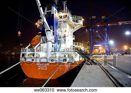 Loading cargo containers in ship, Port of Bilbao, Santurtzi. Biscay, Euskadi, Spain View Large Photo Image Stock Image - Loading cargo containers in ship, Port of Bilbao, Santurtzi. Biscay, Euskadi, Spain. Fotosearch