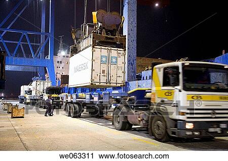 Stock Image - Loading cargo containers in ship, Port of Bilbao, Santurtzi. Biscay, Euskadi, Spain. Fotosearch