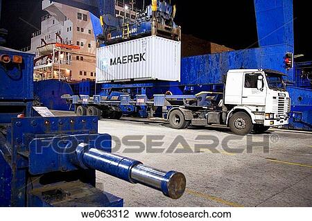 Stock Image - Loading cargo containers in ship, Port of Bilbao, Santurtzi. Biscay, Euskadi, Spain. Fotosearch