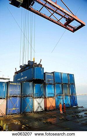 Loading cargo containers in ship, Port of Bilbao, Santurtzi. Biscay, Euskadi, Spain View Large Photo Image Stock Photo - Loading cargo containers in ship, Port of Bilbao, Santurtzi. Biscay, Euskadi, Spain. Fotosearch