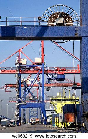 Loading cargo containers in ship, Port of Bilbao, Santurtzi. Biscay, Euskadi, Spain View Large Photo Image Stock Photo - Loading cargo containers in ship, Port of Bilbao, Santurtzi. Biscay, Euskadi, Spain. Fotosearch