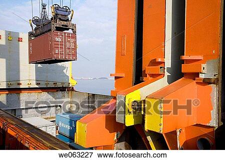 Loading cargo containers in ship, Port of Bilbao, Santurtzi. Biscay, Euskadi, Spain View Large Photo Image Stock Photo - Loading cargo containers in ship, Port of Bilbao, Santurtzi. Biscay, Euskadi, Spain. Fotosearch