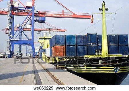 Loading cargo containers in ship, Port of Bilbao, Santurtzi. Biscay, Euskadi, Spain View Large Photo Image Stock Photo - Loading cargo containers in ship, Port of Bilbao, Santurtzi. Biscay, Euskadi, Spain. Fotosearch