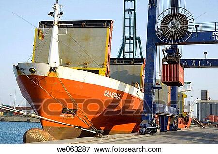 Loading cargo containers in ship, Port of Bilbao, Santurtzi. Biscay, Euskadi, Spain View Large Photo Image Stock Photo - Loading cargo containers in ship, Port of Bilbao, Santurtzi. Biscay, Euskadi, Spain. Fotosearch
