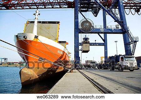 Loading cargo containers in ship, Port of Bilbao, Santurtzi. Biscay, Euskadi, Spain View Large Photo Image Stock Photo - Loading cargo containers in ship, Port of Bilbao, Santurtzi. Biscay, Euskadi, Spain. Fotosearch