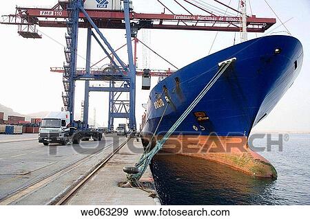 Loading cargo containers in ship, Port of Bilbao, Santurtzi. Biscay, Euskadi, Spain View Large Photo Image Stock Photo - Loading cargo containers in ship, Port of Bilbao, Santurtzi. Biscay, Euskadi, Spain. Fotosearch
