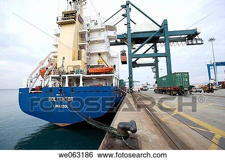 Loading cargo containers in ship, Port of Bilbao, Santurtzi. Biscay, Euskadi, Spain View Large Photo Image Stock Photograph - Loading cargo containers in ship, Port of Bilbao, Santurtzi. Biscay, Euskadi, Spain. Fotosearch