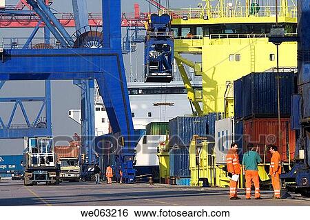 Stock Photograph - Loading cargo containers in ship, Port of Bilbao, Santurtzi. Biscay, Euskadi, Spain. Fotosearch