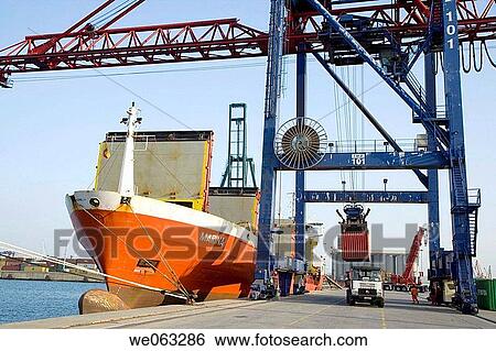 Loading cargo containers in ship, Port of Bilbao, Santurtzi. Biscay, Euskadi, Spain View Large Photo Image Stock Photograph - Loading cargo containers in ship, Port of Bilbao, Santurtzi. Biscay, Euskadi, Spain. Fotosearch