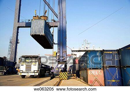 Loading cargo containers in ship, Port of Bilbao, Santurtzi. Biscay, Euskadi, Spain View Large Photo Image Stock Photography - Loading cargo containers in ship, Port of Bilbao, Santurtzi. Biscay, Euskadi, Spain. Fotosearch