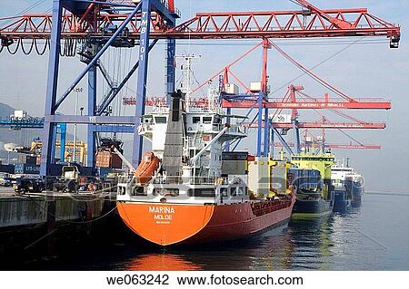 Loading cargo ships, Port of Bilbao, Santurtzi. Biscay, Euskadi, Spain View Large Photo Image Stock Image - Loading cargo ships, Port of Bilbao, Santurtzi. Biscay, Euskadi, Spain. Fotosearch