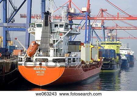 Loading cargo ships, Port of Bilbao, Santurtzi. Biscay, Euskadi, Spain View Large Photo Image Stock Image - Loading cargo ships, Port of Bilbao, Santurtzi. Biscay, Euskadi, Spain. Fotosearch
