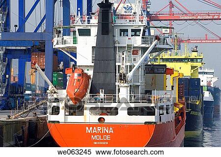 Loading cargo ships, Port of Bilbao, Santurtzi. Biscay, Euskadi, Spain View Large Photo Image Stock Photography - Loading cargo ships, Port of Bilbao, Santurtzi. Biscay, Euskadi, Spain. Fotosearch