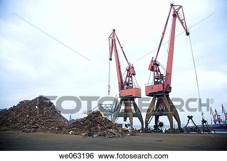 Loading junk metal to be melted, Port of Bilbao, Santurtzi. Biscay, Euskadi, Spain View Large Photo Image Stock Photograph - Loading junk metal to be melted, Port of Bilbao, Santurtzi. Biscay, Euskadi, Spain. Fotosearch