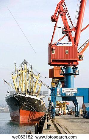 Loading ship, Port of Bilbao, Santurtzi. Biscay, Euskadi, Spain View Large Photo Image Stock Image - Loading ship, Port of Bilbao, Santurtzi. Biscay, Euskadi, Spain. Fotosearch