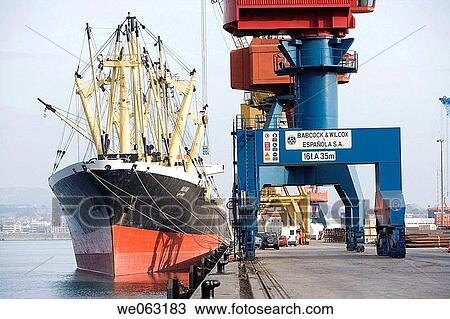 Loading ship, Port of Bilbao, Santurtzi. Biscay, Euskadi, Spain View Large Photo Image Stock Image - Loading ship, Port of Bilbao, Santurtzi. Biscay, Euskadi, Spain. Fotosearch