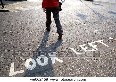 Look left sign on road, London. England, UK View Large Photo Image Stock Photo - Look left sign on road, London. England, UK. Fotosearch
