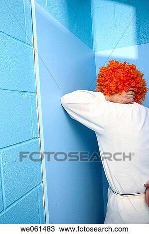 Man posing in his long underware and an orange wig View Large Photo Image Stock Image - Man posing in his long underware and an orange wig. Fotosearch