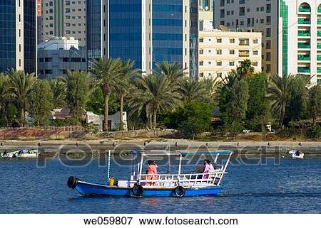 Middle east, UAE (United Arab Emirates), sharjah creek skyline View Large Photo Image Stock Photo - Middle east, UAE (United Arab Emirates), sharjah creek skyline. Fotosearch