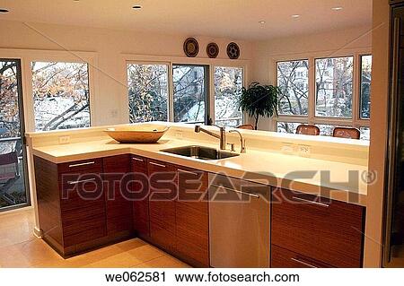 Modern kitchen in a contemporary home on the water. View Large Photo Image Stock Image - Modern kitchen in a contemporary home on the water.. Fotosearch