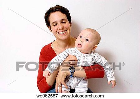Mother and six-month-old baby View Large Photo Image Stock Photo - Mother and six-month-old baby. Fotosearch