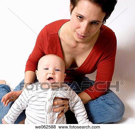 Stock Photo - Mother and six-month-old baby. Fotosearch