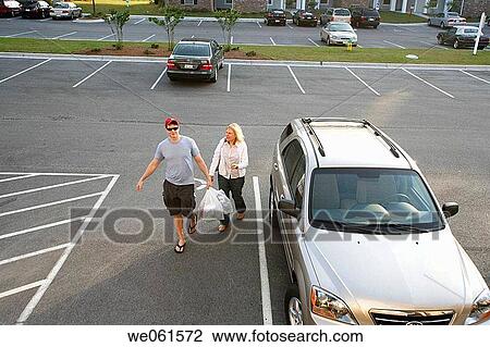 Mother and son returning from shopping View Large Photo Image Stock Image - Mother and son returning from shopping. Fotosearch