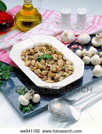 Mushrooms in garlic sauce View Large Photo Image Stock Image - Mushrooms in garlic sauce. Fotosearch