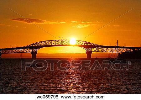 New Zealand, North Island, Auckland, sunset view of the Auckland Harbour Bridge View Large Photo Image Stock Photography - New Zealand, North Island, Auckland, sunset view of the Auckland Harbour Bridge. Fotosearch