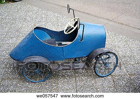 Old blue metal car for kids, Amsterdam, Holland, Netherlands View Large Photo Image Stock Photo - Old blue metal car for kids, Amsterdam, Holland, Netherlands. Fotosearch
