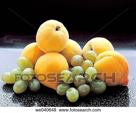 Peaches and grapes View Large Photo Image Stock Photo - Peaches and grapes. Fotosearch