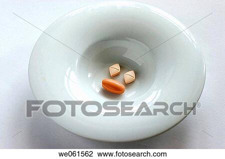 Pills as a face in dish View Large Photo Image Stock Image - Pills as a face in dish. Fotosearch