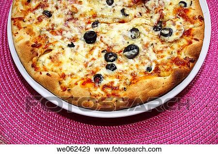 Pizza on pink View Large Photo Image Stock Photo - Pizza on pink. Fotosearch