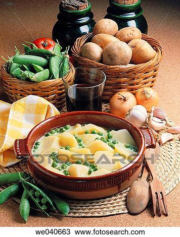 Potatoes with green sauce View Large Photo Image Stock Image - Potatoes with green sauce. Fotosearch