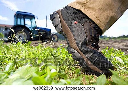 Protective boots, field View Large Photo Image Stock Photo - Protective boots, field. Fotosearch