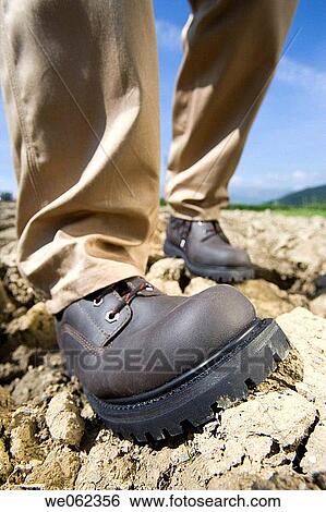 Protective boots, field View Large Photo Image Stock Photograph - Protective boots, field. Fotosearch