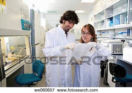 Stock Photo - Researchers discussing working protocols, culture room, biopharmaceutical lab, development of new therapeutic molecules based on human antibodies for the treatment of infectious and inflammatory diseases, Biotherapix, Grupo Genetrix, Madrid. Fotosearch