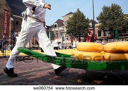 Running carriers with cheese on pallet, cheese market, Kaasmarkt, Alkmaar, Holland, Netherlands View Large Photo Image Picture - Running carriers with cheese on pallet, cheese market, Kaasmarkt, Alkmaar, Holland, Netherlands. Fotosearch