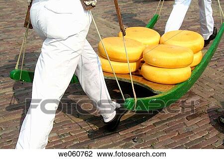 Running carriers with cheese on pallet, cheese market, Kaasmarkt, Alkmaar, Holland, Netherlands View Large Photo Image Stock Image - Running carriers with cheese on pallet, cheese market, Kaasmarkt, Alkmaar, Holland, Netherlands. Fotosearch