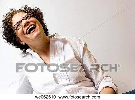 Sixty-four-year old woman smiling View Large Photo Image Stock Image - Sixty-four-year old woman smiling. Fotosearch