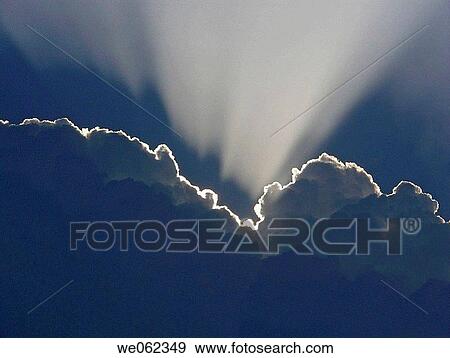 Sky and clouds with sunrays. Pune, Maharashtra, India View Large Photo Image Stock Photo - Sky and clouds with sunrays. Pune, Maharashtra, India. Fotosearch