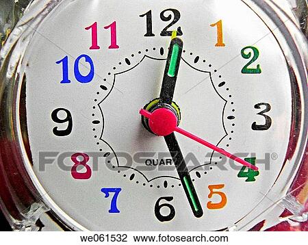 Table clock with colored numbers. View Large Photo Image Stock Image - Table clock with colored numbers.. Fotosearch