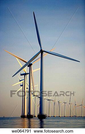 Windmills at sea, wind power View Large Photo Image Stock Image - Windmills at sea, wind power. Fotosearch
