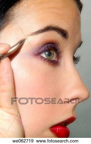 Woman Applying Makeup View Large Photo Image Stock Photo - Woman Applying Makeup. Fotosearch