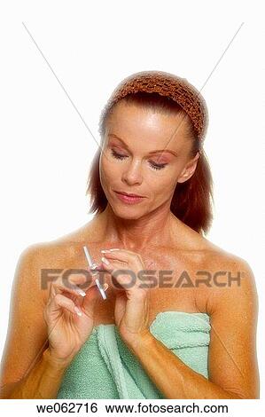 Woman Filing Nails View Large Photo Image Stock Photograph - Woman Filing Nails. Fotosearch