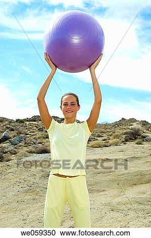 Stock Image - Woman in active wear. Fotosearch