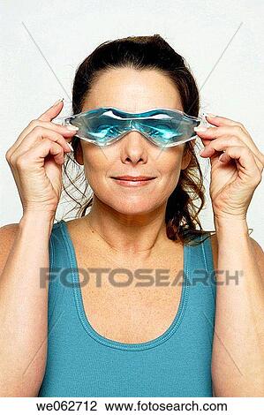 Woman with eye mask View Large Photo Image Stock Image - Woman with eye mask. Fotosearch