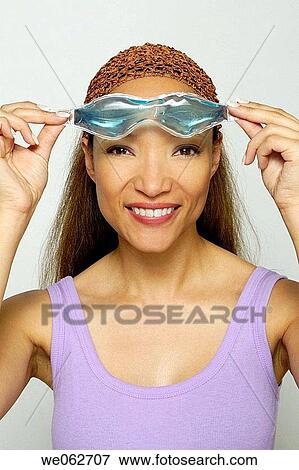 Woman with eye mask View Large Photo Image Stock Photo - Woman with eye mask. Fotosearch