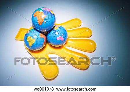 Stock Photo - Yellow plastic hand. Fotosearch