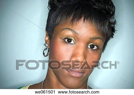Young black woman posing View Large Photo Image Stock Image - Young black woman posing. Fotosearch